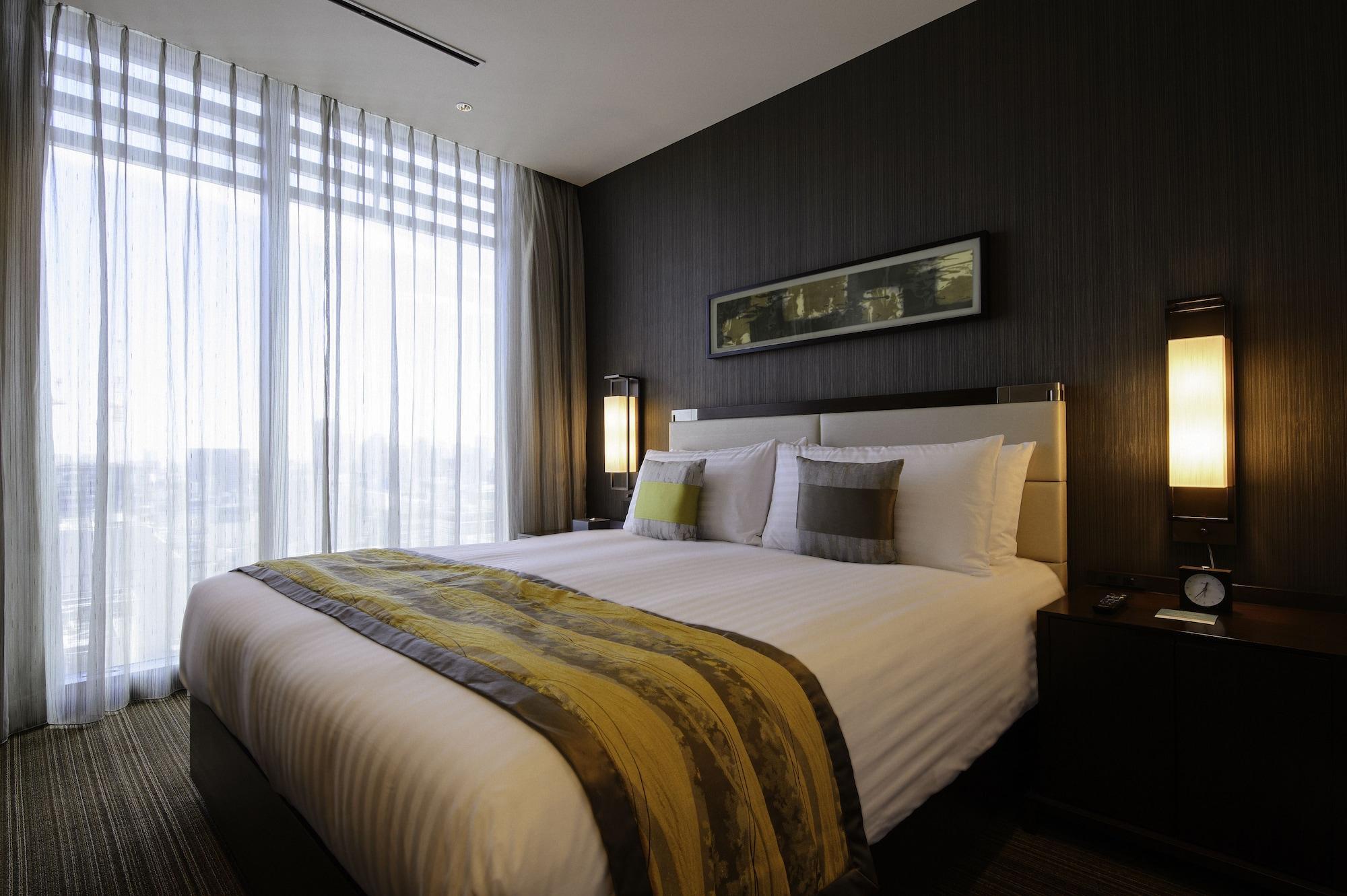 Oakwood Premier Tokyo Hotel Buitenkant foto A bedroom at the hotel