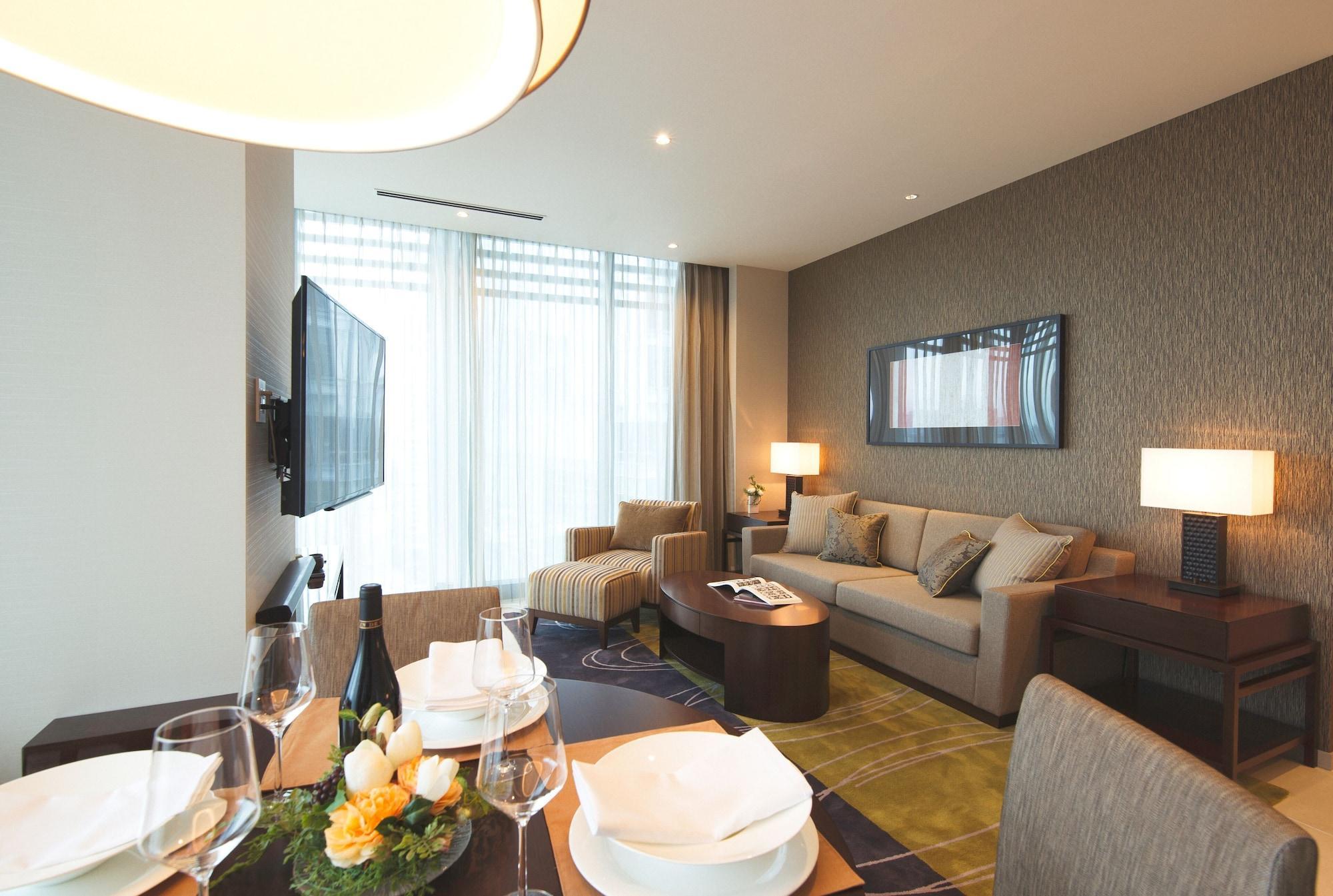Oakwood Premier Tokyo Hotel Buitenkant foto A living room at the hotel