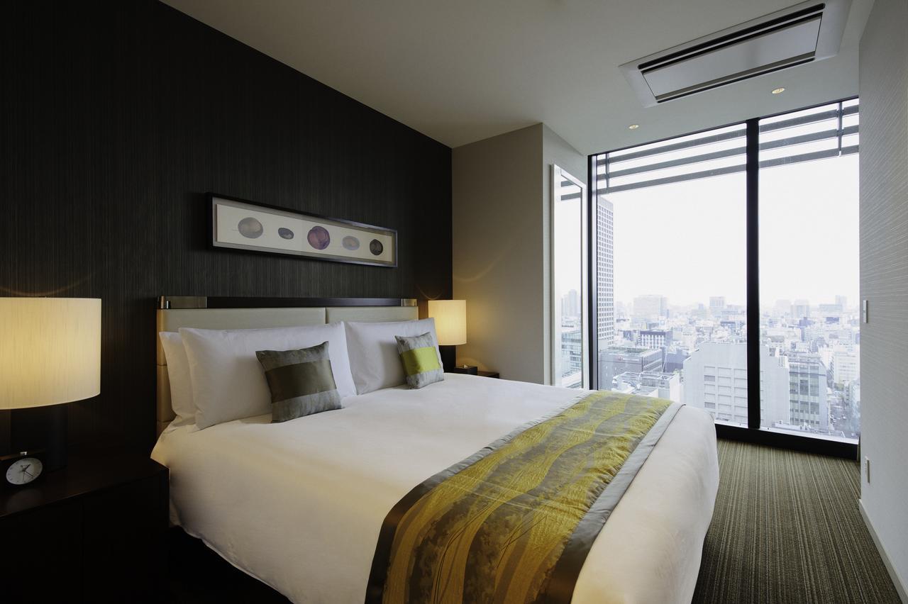 Oakwood Premier Tokyo Hotel Buitenkant foto A bedroom at the hotel